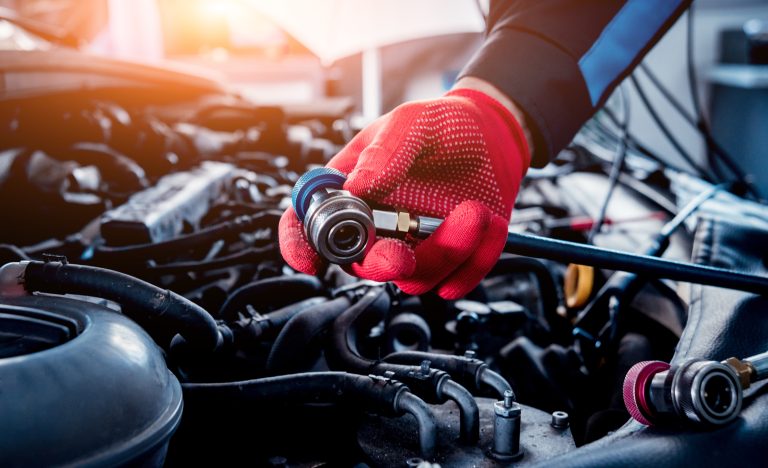 Servicing a car air conditioner